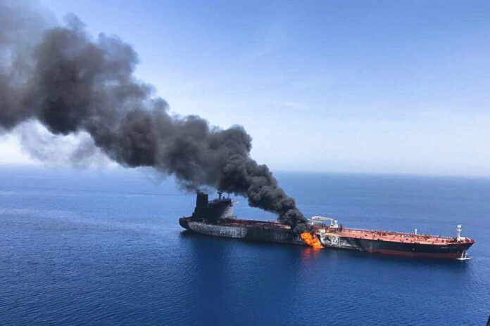 An oil tanker is on fire in the sea of Oman, Thursday, June 13, 2019. Two oil tankers near the strategic Strait of Hormuz were reportedly attacked on Thursday, an assault that left one ablaze and adrift as sailors were evacuated from both vessels and the U.S. Navy rushed to assist amid heightened tensions between Washington and Tehran. Photo: ISNA / AP An oil tanker is on fire in the sea of Oman, Thursday, June 13, 2019. Two oil tankers near the strategic Strait of Hormuz were reportedly attacked on Thursday, an assault that left one ablaze and adrift as sailors were evacuated from both vessels and the U.S. Navy rushed to assist amid heightened tensions between Washington and Tehran. Photo: ISNA / AP