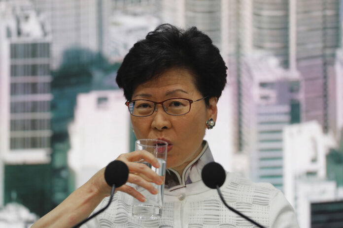 Hong Kong's Chief Executive Carrie Lam attends a press conference on Saturday, June 15, 2019, in Hong Kong. Lam said she will suspend a proposed extradition bill indefinitely in response to widespread public unhappiness over the measure, which would enable authorities to send some suspects to stand trial in mainland courts. Photo: Kin Cheung / AP Hong Kong's Chief Executive Carrie Lam attends a press conference on Saturday, June 15, 2019, in Hong Kong. Lam said she will suspend a proposed extradition bill indefinitely in response to widespread public unhappiness over the measure, which would enable authorities to send some suspects to stand trial in mainland courts. Photo: Kin Cheung / AP