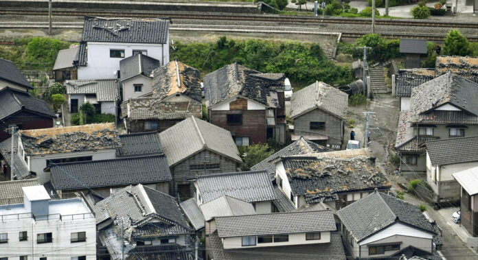 This aerial view shows damaged roof tiles of residential houses in Tsuruoka, Yamagata prefecture, northwestern Japan, Wednesday, June 19, 2019, after an earthquake. Photo: Kyodo News via AP