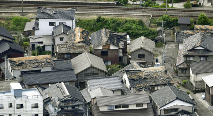 This aerial view shows damaged roof tiles of residential houses in Tsuruoka, Yamagata prefecture, northwestern Japan, Wednesday, June 19, 2019, after an earthquake. Photo: Kyodo News via AP This aerial view shows damaged roof tiles of residential houses in Tsuruoka, Yamagata prefecture, northwestern Japan, Wednesday, June 19, 2019, after an earthquake. Photo: Kyodo News via AP
