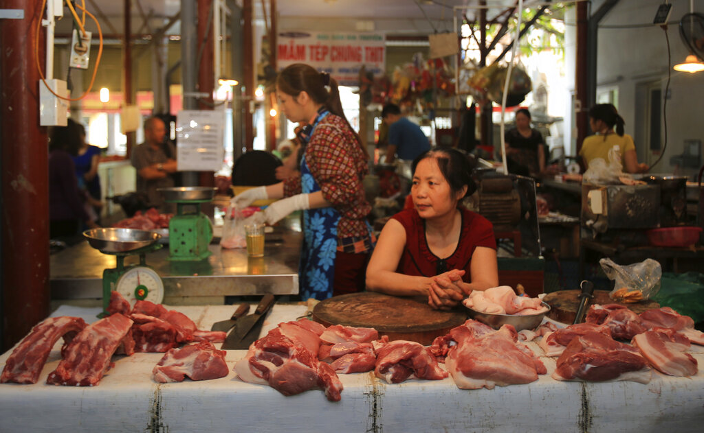 Pork is on display for sale at a market in Hanoi, Vietnam, Thursday, June, 20, 2019. Asian nations are scrambling to contain the spread of the highly contagious African swine fever with Vietnam culling 2.5 million pigs and China reporting more than a million dead in an unprecedentedly huge epidemic governments fear have gone out of control. Photo: Hieu Dinh / AP