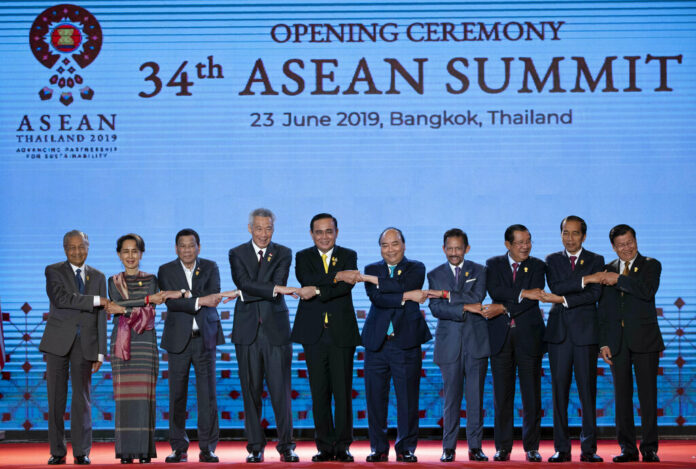 Leaders of the Association of Southeast Asian Nations (ASEAN) from left, Malaysian Prime Minister Mahathir Mohamad, Myanmar leader Aung San Suu Kyi, Philippines President Rodrigo Duterte, Singaporean Prime Minister Lee Hsien Loong, Thailand Prime Minister Prayuth Chan-ocha, Vietnamese Prime Minister Nguyen Xuan Phuc, Brunei Sultan Hassanal Bolkiah, Cambodian Prime Minister Hun Sen, Indonesian President Joko Widodo and Laos Prime Minister Thongloun Sisoulith pose for a group photo during the opening ceremony of the ASEAN leaders summit in Bangkok, Thailand, Sunday, June 23, 2019. Photo: Gemunu Amarasinghe / AP Leaders of the Association of Southeast Asian Nations (ASEAN) from left, Malaysian Prime Minister Mahathir Mohamad, Myanmar leader Aung San Suu Kyi, Philippines President Rodrigo Duterte, Singaporean Prime Minister Lee Hsien Loong, Thailand Prime Minister Prayuth Chan-ocha, Vietnamese Prime Minister Nguyen Xuan Phuc, Brunei Sultan Hassanal Bolkiah, Cambodian Prime Minister Hun Sen, Indonesian President Joko Widodo and Laos Prime Minister Thongloun Sisoulith pose for a group photo during the opening ceremony of the ASEAN leaders summit in Bangkok, Thailand, Sunday, June 23, 2019. Photo: Gemunu Amarasinghe / AP