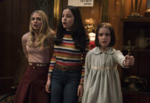 Review: In Latest ‘Annabelle,’ a Babysitting Gig Goes Awry This image released by Warner Bros. Pictures shows Madison Iseman, from left, Katie Sarife and McKenna Grace in a scene from the horror film, "Annabelle Comes Home." Photo: Dan McFadden / Warner Bros. Pictures via AP