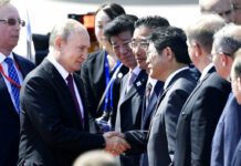 Clash Between Liberal, Authoritarian Values at G20 Summit Russian President Vladimir Putin are greeted on his arrival at Kansai International Airport in Izumisano, Osaka prefecture, Friday, June 28, 2019. Group of 20 leaders gather in Osaka on June 28 and 29 for their annual summit. Photo: Junko Ozaki / Kyodo News via AP