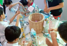 Turn Plastic Waste Into Eco-Bricks at the World Oceans Day Fair Students making eco-bricks in December 2018. Photo: Trash Hero Bangkok / Facebook