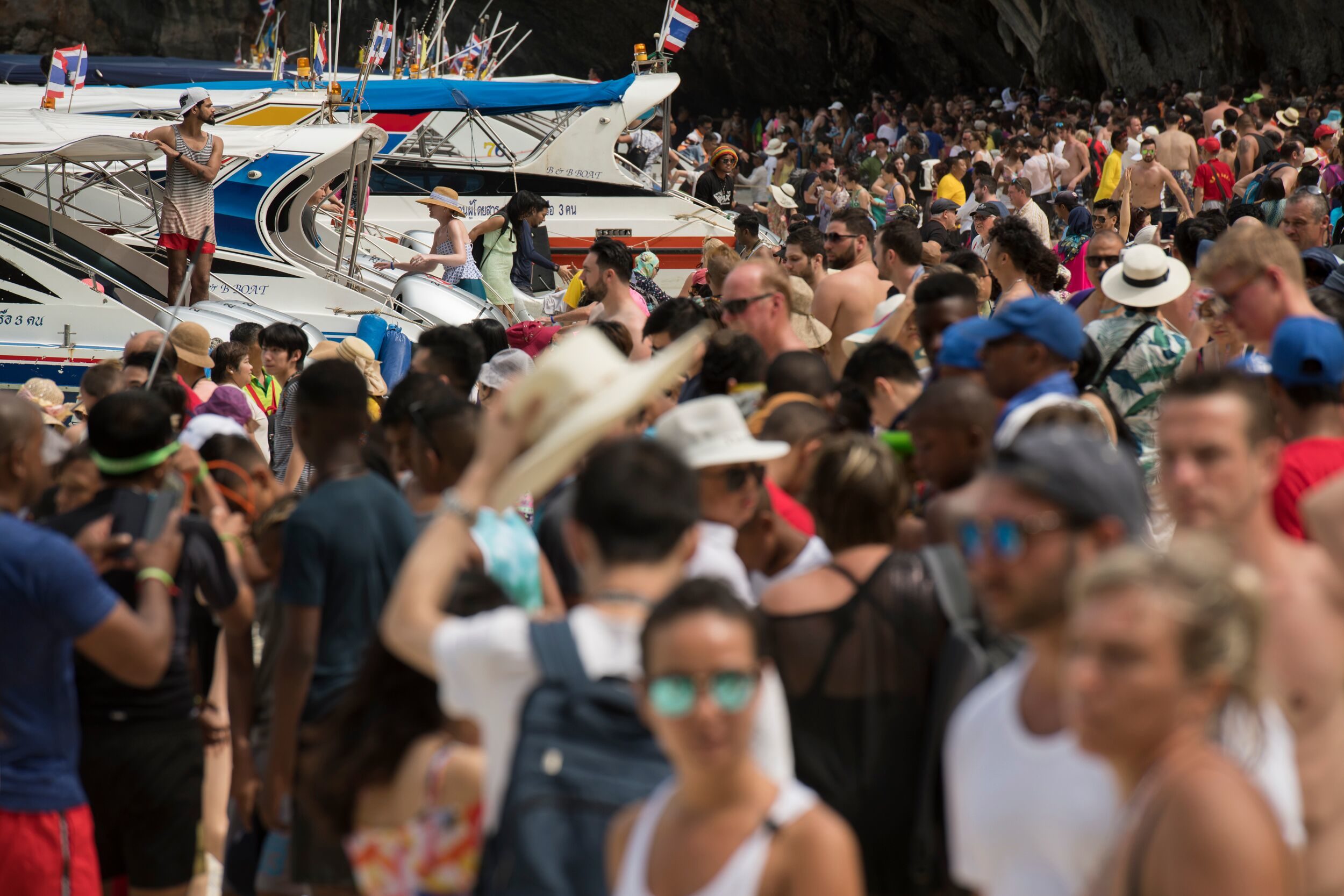 Tourists on Maya Bay in 2018 before its closure. The bay could see up to 5,000 tourists in a single day. Photo: Sirachai Arunrugstichai / Courtesy