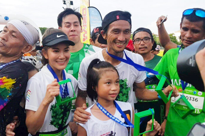 Artiwara ‘Toon’ Kongmalai at the finish line of his Isaan charity run on June 16, 2019 at the Khon Kaen Sports Stadium.