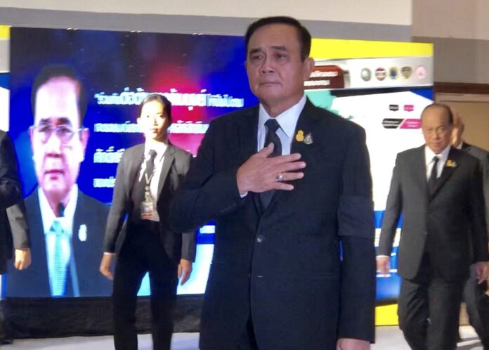 Junta chairman Prayuth Chan-ocha gestures to reporters on June 5, 2019.
