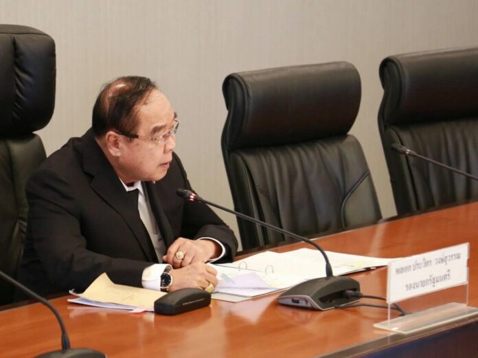 Deputy junta chairman Prawit Wongsuwan chairs a government meeting in November 2016.