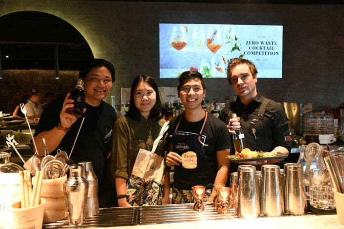 Rojanat Charoensri, left, the winner of Thailand’s first zero-waste cocktail contest on June 19, 2019 at Suk Bar.