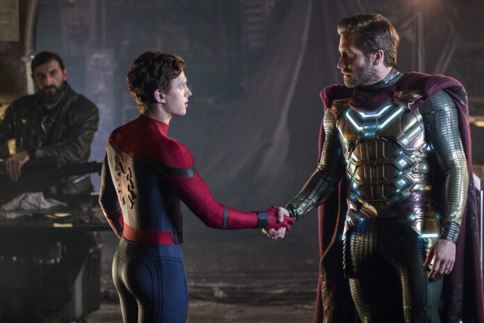 This image released by Sony Pictures shows, from left, Numan Acar, Tom Holland and Jacky Gyllenhaal in a scene from This image released by Sony Pictures shows, from left, Numan Acar, Tom Holland and Jacky Gyllenhaal in a scene from