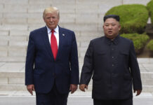 At DMZ, Step Into History for Trump as He Offers Hand to Kim President Donald Trump, left, meets with North Korean leader Kim Jong Un at the North Korean side of the border at the village of Panmunjom in Demilitarized Zone, Sunday, June 30, 2019. Photo: Susan Walsh / AP