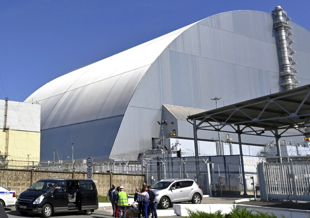 FILE - This June 1, 2019, file photo shows a view of the New Safe Confinement (NSC) movable enclosure at the nuclear power plant in Chernobyl, Ukraine. A new structure built to confine the Chernobyl nuclear reactor at the center of the world's worst nuclear disaster has been previewed for the media. Photo: Sergei Supinsky / Pool Photo via AP File