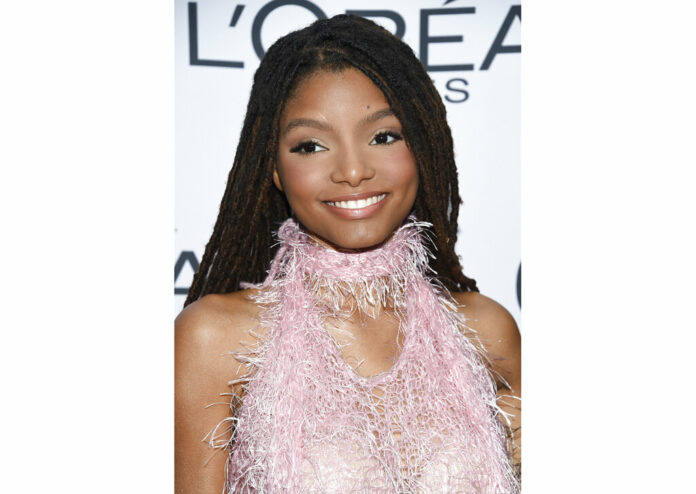 FILE - This Nov. 13, 2017 file photo shows singer-actress Halle Bailey at the 2017 Glamour Women of the Year Awards in New York. Bailey, half of the sister duo Chloe x Halle, will next be going under the sea, starring as Ariel in the upcoming adaptation of “The Little Mermaid.” The live-action version will include original songs from the 1989 animated hit as well as new tunes from original composer Alan Menken and “Hamilton” creator Lin-Manuel Miranda. Photo: Evan Agostini/Invision / AP File