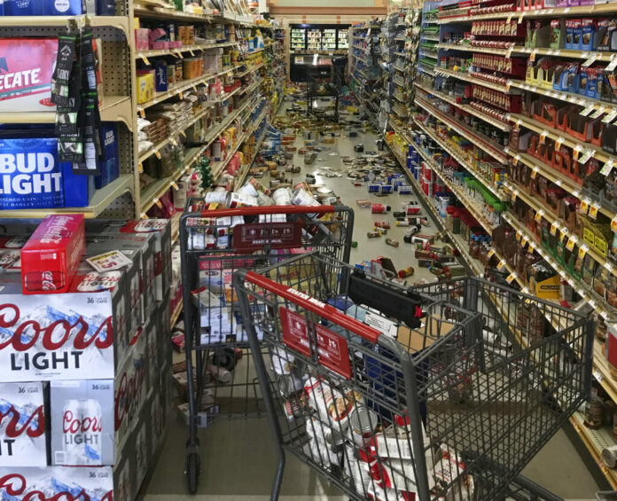 In this photo provided by Adam Graehl, food and other merchandise lies on the floor at the Stater Bros. on China Lake Blvd., after an earthquake, Thursday, July 4, 2019, in Ridgecrest, Calif. The strongest earthquake in 20 years shook a large swath of Southern California and parts of Nevada on Thursday, rattling nerves on the July 4th holiday and causing injuries and damage in a town near the epicenter, followed by a swarm of ongoing aftershocks. Photo: Adam Graehl via AP In this photo provided by Adam Graehl, food and other merchandise lies on the floor at the Stater Bros. on China Lake Blvd., after an earthquake, Thursday, July 4, 2019, in Ridgecrest, Calif. The strongest earthquake in 20 years shook a large swath of Southern California and parts of Nevada on Thursday, rattling nerves on the July 4th holiday and causing injuries and damage in a town near the epicenter, followed by a swarm of ongoing aftershocks. Photo: Adam Graehl via AP