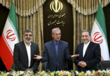 Iran Steps Further From Nuke Deal, Adding Pressure on Europe From left to right, spokesman for Iran's atomic agency Behrouz Kamalvandi, Iran's government spokesman Ali Rabiei and Iranian Deputy Foreign Minister Abbas Araghchi, attend a press briefing in Tehran, Iran, Sunday, July 7, 2019. The deputy foreign minister says that his nation considers the 2015 nuclear deal with world powers to be a "valid document" and seeks its continuation. Photo: Ebrahim Noroozi / AP