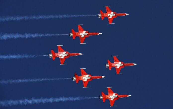 In this Friday, Jan. 18, 2019 file photo, the Swiss Air Force Patrouille Suisse aerobatic team performs during an alpine ski, men's World Cup combined in Wengen, Switzerland. The commander of the Swiss air force's aerobatics display team has apologized after his unit performed a low-altitude pass over the wrong village at the weekend Saturday July 6 - Sunday July 7, 2019. Photo: Marco Tacca / AP