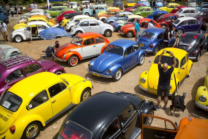 n this April 21, 2017 file photo, Volkswagen Beetles are displayed during the annual gathering of the 