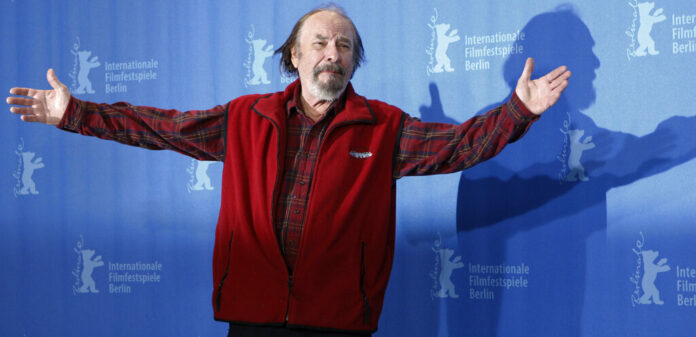 In this Wednesday, Feb. 11, 2009, file photo, U.S. actor Rip Torn poses during a photo call for the competition movie 