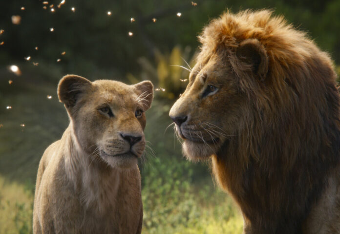 This image released by Disney shows Nala, voiced by Beyoncé Knowles-Carter, left, and Simba, voiced by Donald Glover in a scene from 