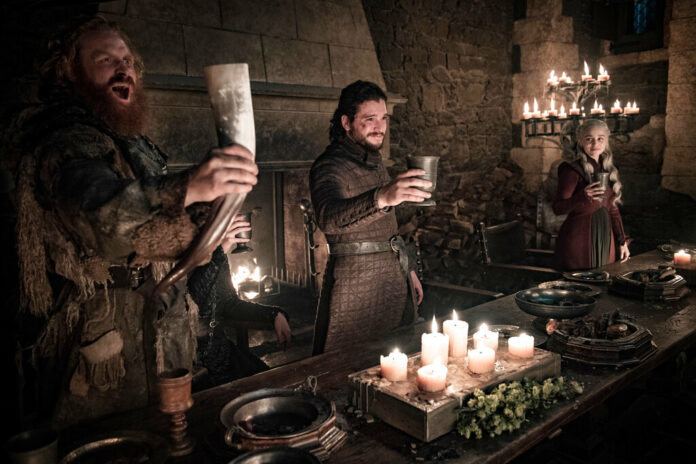 This image released by HBO shows Kristofer Hivju, from left, Kit Harington and Emilia Clarke in a scene from 