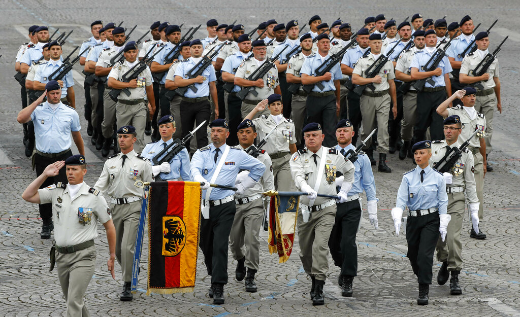 German soldiers march on the Champs-Elysees avenue during the Bastille Day parade in Paris, France, Sunday July 14, 2019. Photo: Michel Euler / AP