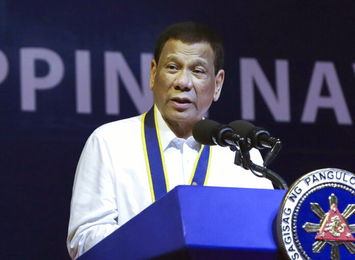 FILE - In this June 17, 2019, file photo made available by the Malacanang Presidential Photo, Philippine President Rodrigo Duterte delivers his speech during the 121st Philippine Navy Anniversary at Sangley point, Cavite province, Philippines. Duterte is FILE - In this June 17, 2019, file photo made available by the Malacanang Presidential Photo, Philippine President Rodrigo Duterte delivers his speech during the 121st Philippine Navy Anniversary at Sangley point, Cavite province, Philippines. Duterte is