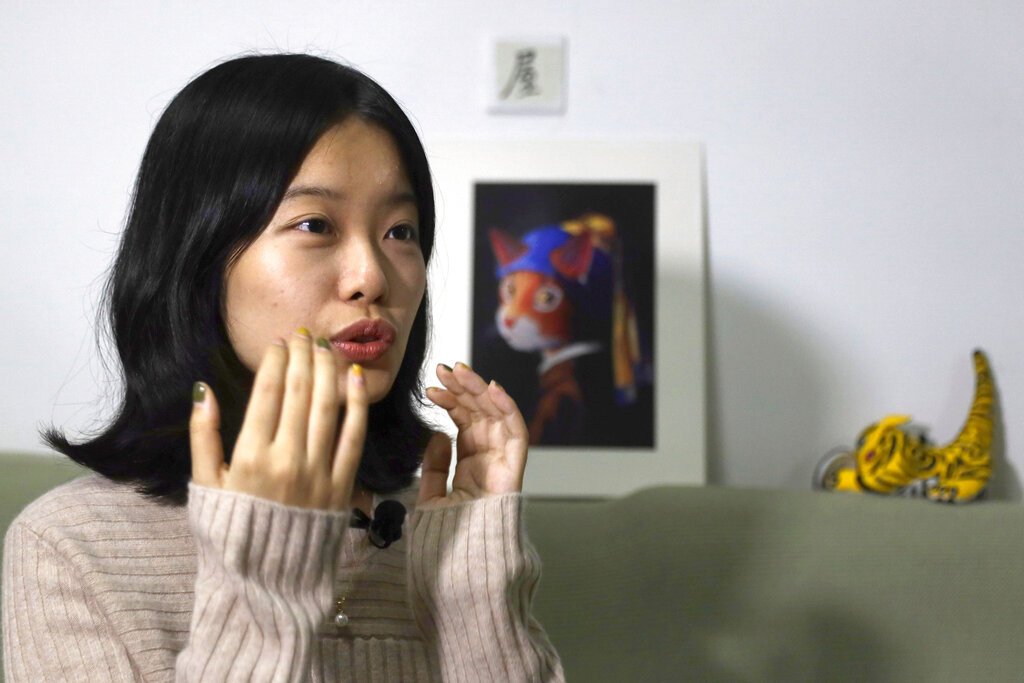 In this Jan. 16, 2019, photo, screenwriter Zhou Xiaoxuan speaks during an interview with the Associated Press at her home in Beijing, China, detailing her involvement in China's #MeToo movement. Photo: Ng Han Guan / AP