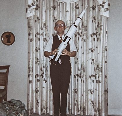 This June 1969 photo made by Frank Schramm shows his father, Frank, holding a model of a Saturn V rocket. The junior Schramm had an utter fascination with the moon landing ever since the Apollo 11 mission. He and his family even met Buzz Aldrin in 2016 when the former astronaut returned to Montclair to celebrate his old middle school being renamed Buzz Aldrin Middle School. Photo: Frank Schramm via AP