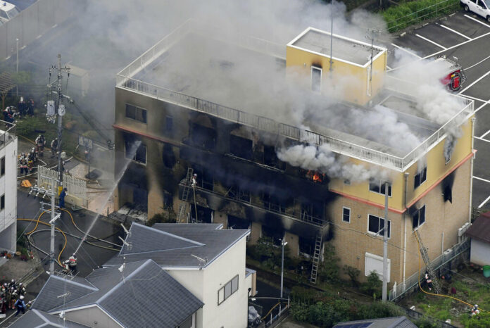 Smoke billows from a three-story building of Kyoto Animation in a fire in Kyoto, western Japan, Thursday, July 18, 2019. Kyoto prefectural police said the fire broke out Thursday morning after a man burst into it and spread unidentified liquid and put fire. Photo:Kyodo News via AP