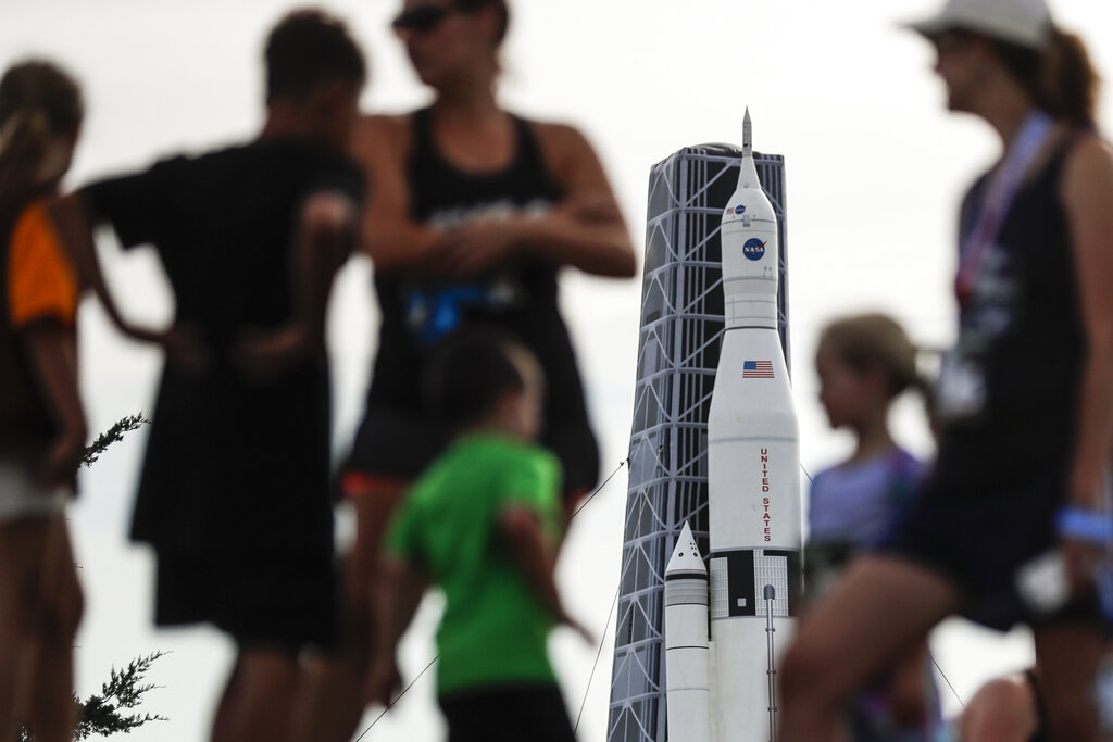 Visitors gather on the grounds of the Armstrong Air and Space Museum as a scale model of NASA's developing Space Launch System is displayed as part of events commemorating the 50th anniversary of the first moon landing, Saturday, July 20, 2019, in Wapakoneta, Ohio. Photo: John Minchillo / AP