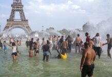 Europe Melts Under Sahara Heat Wave, Smashes Heat Records People cool down in the fountains of the Trocadero gardens in Paris, Thursday July 25, 2019, when a new all-time high temperature of 42.6 degrees Celsius (108.7 F) hit the French capital. in the background is the Eiffel Tower. Photo: Rafael Yaghobzadeh / AP