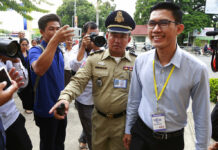 Trial of Cambodian Reporters Who Used to Work for US Begins Former Radio Free Asia reporter Yeang Sothearin, left, arrives at the Phnom Penh Municipal Court, in Phnom Penh, Cambodia, Friday, July 26, 2019. Photo: Heng Phearum / AP