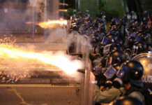 Police Fire Tear Gas, Rubber Bullets at Hong Kong Protesters Hong Kong police fire tear gas at protesters in Sai Wan, Hong Kong on Sunday, July 28, 2019. Photo: Jeff Cheng / HK01 via AP