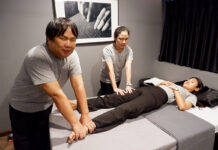 Blind Eyes, Working Hands at Perception Massage Anant “Nat” Kumsawang and Chutima “Yui” Panpong massaging another employee of Perception Massage.