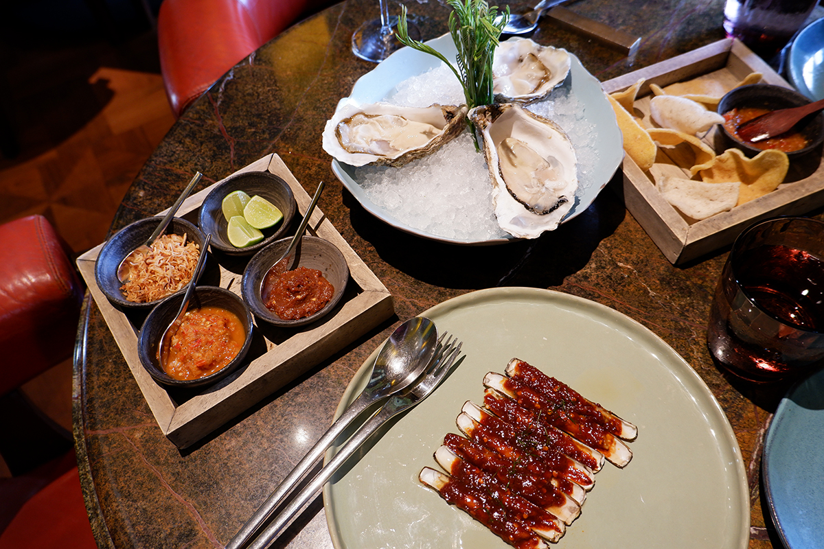 Jean-Pul N1 oysters (690 baht) with the French razor clams flambeed in Mekhong rum and XO sauce (520 baht).