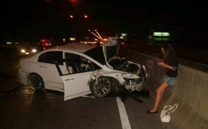 Orachorn “Praewa” Thephasadin Na Ayudhya at the crash site in 2010.