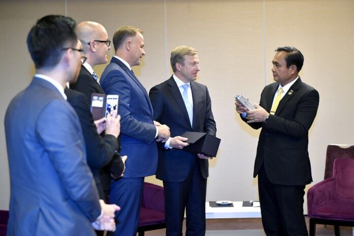 Junta chairman Prayuth Chan-ocha urges representatives of German businesses to invest more in Thailand during his November 2018 visit to Berlin.