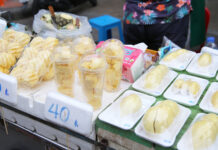 Vendors Balk at Khaosan Road’s Call to Ban Plastic, Styrofoam Pineapples served in plastic cups and durian wrapped in styrofoam trays in Khaosan on July 2.