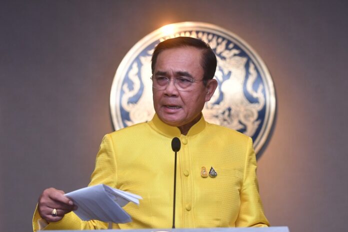 Junta chairman Prayuth Chan-ocha speaks to reporters July 9, 2019, at Government House.