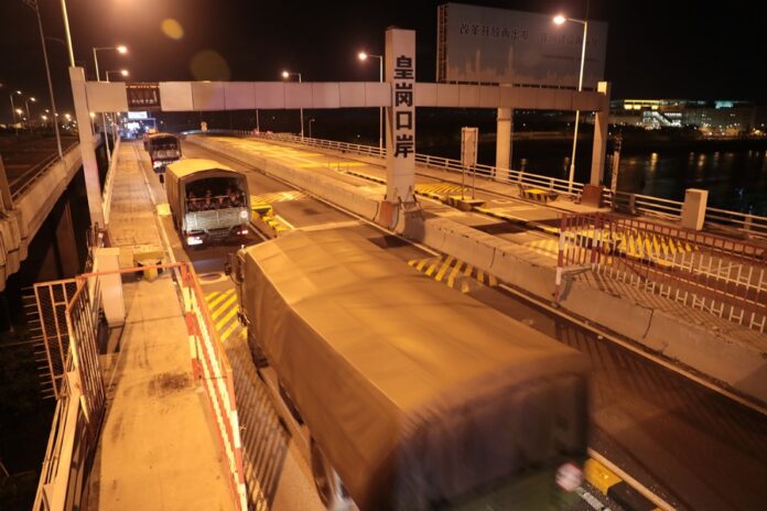 Military vehicles carrying soldiers of the Chinese People's Liberation Army (PLA) pass Huanggang Port for a routine troop rotation in South China's Hong Kong, Aug 29, 2019. Image: Xinhua.