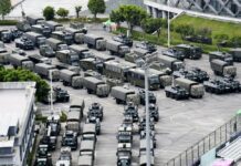 China Flexes Muscle Near Hong Kong Amid Weekend Rallies