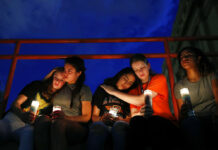 Texas Governor: 20 Dead in El Paso Shopping Center Shooting From left, Melody Stout, Hannah Payan, Aaliyah Alba, Sherie Gramlich and Laura Barrios comfort each other during a vigil for victims of the shooting Saturday, Aug. 3, 2019, in El Paso, Texas. Photo:John Locher / AP