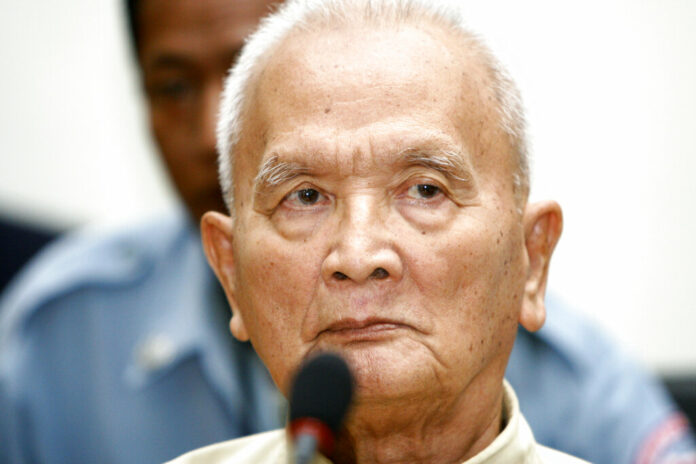 In this March, 20, 2008 file photo, former Khmer Rouge's chief ideologist and No. 2 leader, Nuon Chea, foreground, sits in the court hall before the final statements at the U.N.-backed war crimes tribunal in Phnom Penh, Cambodia. Photo: Heng Sinith, File / AP