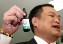 Anutin Receives Cannabis Oil for Medical Use Thailand's Public Health Minister Anutin Chanvirakul shows off a bottle of extracted cannabis oil during a press conference at his ministry in Bangkok, Thailand, Wednesday, Aug. 7, 2019. The Health Ministry received its first batch of legal medical marijuana to be distributed in state-run hospitals. Photo: Sakchai Lalit / AP