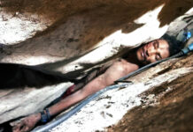 Cambodian Rescued After 4 Days Wedged in Mountain Rocks In this photo provided by Battambang province Authority Police, Sum Bora, a 28-year-old man who got stuck in the rock's hollow at Battambang province in northwestern of Phnom Penh, Cambodia, Wednesday, Aug. 7, 2019. Sum Bora, who became wedged between rocks while collecting bat droppings for sale, was rescued Wednesday after being trapped for almost four days. Photo: Battambang Province Authority Police via AP