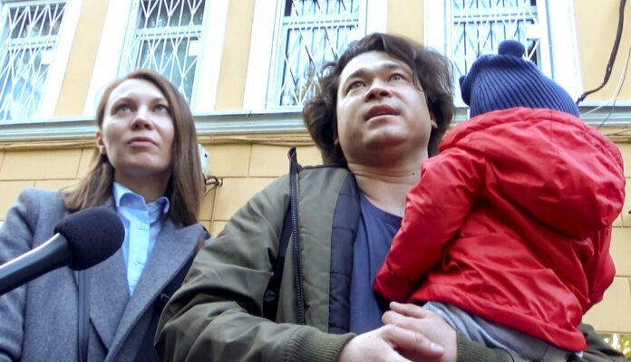 This video grab provided by TV Rain on Tuesday, Aug. 6, 2019, shows Dmitri and Olga Prokazov, parents of a 1-year-old boy speaking to journalists in Moscow, Russia . Moscow's children's rights ombudsman and other public figures have reacted with outrage to Russian prosecutors' moves to remove a 1-year-old boy from his parents because they allegedly took him to an unauthorized protest. Photo: TV RAIN via AP RUSSIA OUT