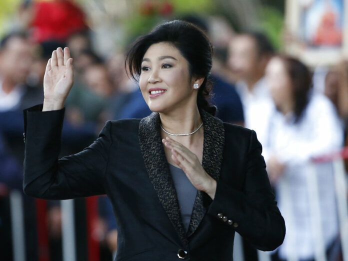FILE - In this Tuesday, Aug. 1, 2017 file photo, Thailand's former Prime Minister Yingluck Shinawatra waves to supporters as she arrives at the Supreme Court in Bangkok, Thailand. Serbian media say fugitive former Thai Prime Minister Yingluck Shinawatra has received Serbian citizenship. State news agency Tanjug said Thursday, Aug. 8, 2019 that the Serbian government granted her the citizenship “because it could be in the interest of Serbia.” Photo: Sakchai Lalit / AP File