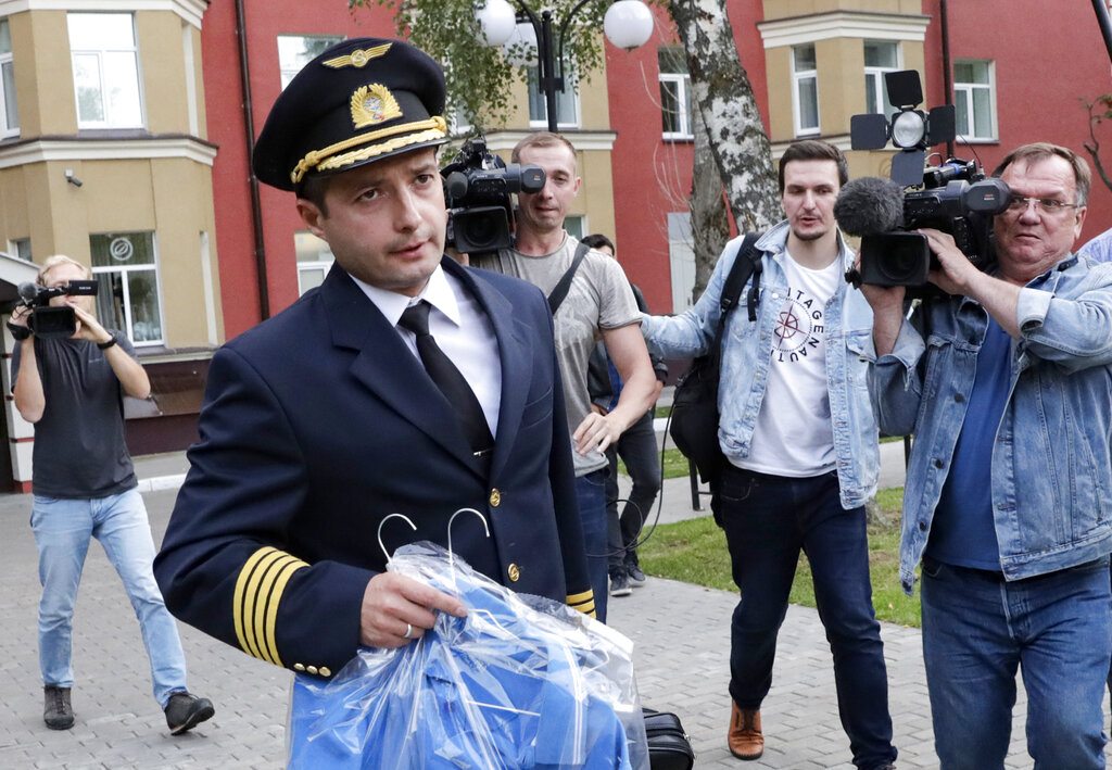 Damir Yusupov, 41, the captain of Ural Airlines A321, walks to attend a news conference in Ramenskoye, just outside Moscow, Russia, Thursday, Aug. 15, 2019.  The captain of a Russian passenger jet was hailed as a hero Thursday for landing his plane in a cornfield after it collided with a flock of gulls seconds after takeoff, causing both engines to malfunction. Photo: Vladimir Shatilov / AP