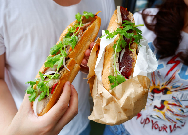 The Pork Belly Banh Mi (130 baht) and the Traditional Banh Mi (150 baht).